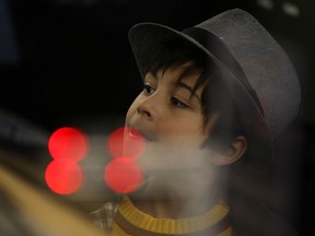 Jordan Richtig, 6, checks out the model trains at the Windsor Model Railroad Club's open house in the basement of Market Square, Saturday, Feb. 15, 2014.  (DAX MELMER/The Windsor Star)