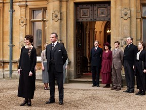 In this scene from the hugely popular TV series, Downton Abbey, Elizabeth McGovern, left, and Hugh Bonneville  stand in front of Dan Stevens, Penelope Wilton, Allen Leech, Jim Carter and Phyllis Logan. (PBS Television)