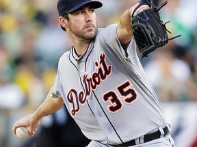 Detroit's Justin Verlander pitches against the Athletics during the ALDS October 10, 2013 in Oakland. (Ezra Shaw/Getty Images)