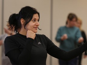 Hidden Dragon Martial Arts instructor Anne Marie Isshack participates in a women's self-defence class at the Safety Village and hosted by Neighbourhood Watch Windsor. (DAX MELMER / The Windsor Star)