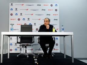 Fiat and Chrysler CEO Sergio Marchionne speaks during media previews during the North American International Auto Show in Detroit on Jan. 13, 2014. (Paul Sancya / The Associated Press)