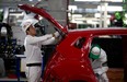 Employees work the assembly line in the new multibillion-dollar Honda car plant in Celaya, in the central Mexican state of Guanajuato, earlier this month. (Eduardo Verdugo / Associated Press)