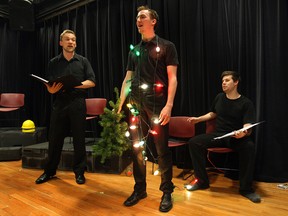 The University of Windsor School of Dramatic Art students Erik Helle, left, Brian Haight and Grant Gignac rehearse a scene from No Great Mischief on Tuesday, (DAN JANISSE / The Windsor Star)