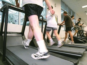 Single adults have more time to plan workouts. (Steve Sanford / Postmedia News files)