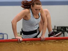 Kari Tofflemire, a Windsor Police recruit candidate, takes P.R.E.P., a physical readiness evalutation for police while visiting F.A. Tilston Armouries Thursday March 6, 2014.  (NICK BRANCACCIO/The Windsor Star)