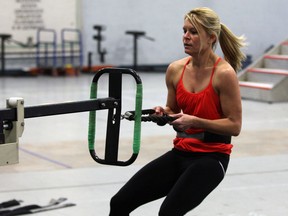 Kelly Steele at F.A. Tilston Armouries where she and other, real recruits participate in P.R.E.P., the physical readiness evaluation for police, Thursday March 6, 2014.  (NICK BRANCACCIO/The Windsor Star)