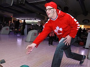 Greg Cutting participates in the Bowl For Kids Sake, A Big Brothers Big Sisters of Windsor Essex fundraising event at Rose Bowl Lanes, Saturday, March 1, 2014.  (DAX MELMER/The Windsor Star)