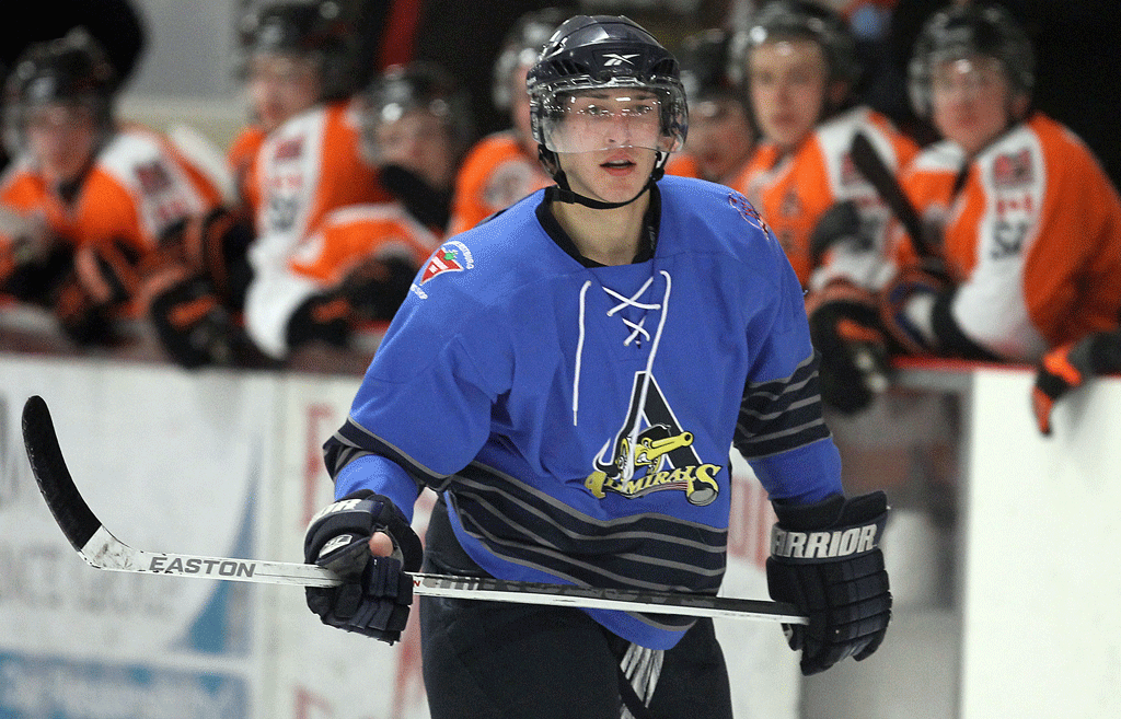 Danny Vanderwiel of the Plymouth Whalers moves the puck against