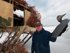 Dennis Laporte wants someone to take responsibility for deserted duck blinds which litter Lake Erie shoreline near Kingsville March 14, 2014. (NICK BRANCACCIO/The Windsor Star)