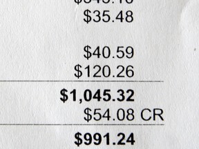 In this file photo, Garry Major of Lauzon Road would like to know why his Hydro One bill has been so high, with one bill almost reaching $1,000. (NICK BRANCACCIO/The Windsor Star)