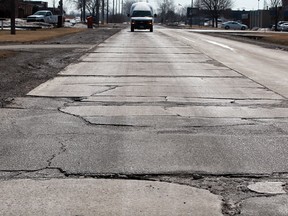 Yes there are some potholes, but Devon Drive is simply a mess, March 18, 2014. (NICK BRANCACCIO/The Windsor Star)