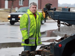 Sandwich West Towing manager Jeff Kwaitkowski is keeping his eye on proposed legislation for towing operator's safety March 19, 2014.  Sandwich West towing operator Paul Rocheleau was killed while stopped on the shoulder of Highway 3 in 2012. (NICK BRANCACCIO/The Windsor Star)