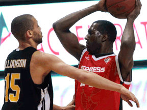 Windsor's Chris Commons, right, is guarded by London's Garrett Williamson at the WFCU Centre. (NICK BRANCACCIO/The Windsor Star)