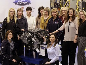 Fast and powerful Ford 5.0L engine built at Essex Engine Plant by a team of women managers (clockwise from front left) Nina Haggins, Mfg. Technical Analyst, Sandy Ilievski, Team Manager Production, Karen Leblanc, Team Manager Mfg. Technical Analyst, Dejana Corovic, Mfg. Technical Analyst, Dianne Kellett, Team Manager Maintenance, Kim Woodbridge, Team Manager Finance, Shaun Whitehead, Site Manager, Sally Baia, Mfg Engrg Analyst, Jody Arnold, Mfg Technical Analyst, Sara Selthofer, Engineering Resident, Diana Grbesic, Quality Analyst, kneeling right. March 6, 2014. (NICK BRANCACCIO/The Windsor Star)
