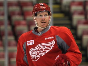 Detroit Red Wing Daniel Alfredsson takes a break during practice Tuesday, March 18, 2014, at Joe Louis Arena in Detroit, Mich. (DAN JANISSE/The Windsor Star)