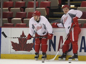Landon Ferraro (L), next to Teemu Pulkkinen will make his season debut with the Detroit Red Wings Tuesday against the Carolina Hurricanes.