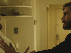 Jake Gyllenhaal (left) is pictured in a scene from Denis Villeneuve's "Enemy", in a studio handout photo. (THE CANADIAN PRESS/HO)