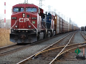 CP freight train heads east along tracks at North Service Road crossing Thursday March 20, 2014. (NICK BRANCACCIO/The Windsor Star)