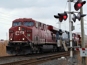 CP freight train heads east along tracks at Jefferson Avenue crossing near Windsor Airport Thursday March 20, 2014. (NICK BRANCACCIO/The Windsor Star)