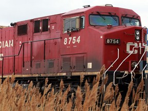 CP Rail locomotive passes a pedestrian path and crossing near Memorial Park, just south of Ypres Blvd. Thursday March 20, 2014. (NICK BRANCACCIO/The Windsor Star)