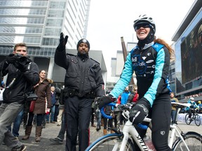 Clara's Big Ride for Bell Let's Talk begins: Six-time Olympian Clara Hughes starts in Toronto an unprecedented 110-day journey to build a Canada free of the stigma around mental illness, that will lead her to the Parliament Hill in Ottawa on July 1st. (CNW Group/Bell Canada)