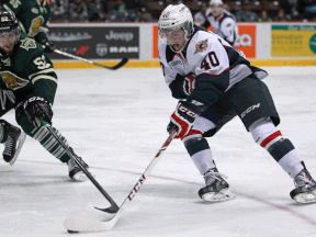 Windsor's Ryan Moore, right, tries to get past London's Alex Basso at the WFCU Centre. (DAX MELMER/The Windsor Star)