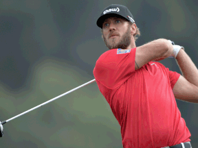 Graham DeLaet tees off on the 18th hole during the final round of the Farmers Insurance Open at Torrey Pines South in La Jolla, California. (Photo by Donald Miralle/Getty Images)