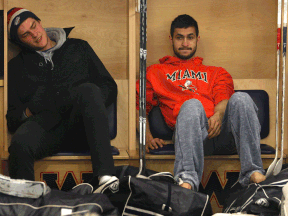 Windsor defenceman Patrick Sanvido, left, and goalie Alex Fotinos wait for an exit interview with the team's coaching staff Friday March 28, 2014 at the WFCU Centre. (DAN JANISSE/The Windsor Star)