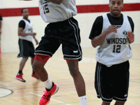 Quinnel Brown, left, and Darren Duncan of the Windsor Express practise at the Rose City Islamic Centre Monday. (NICK BRANCACCIO/The Windsor Star)