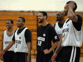 Windsor's Stefan Bonneau, from left, Darren Duncan, R.J. Wells, Quinnel Brown and George Goode take a break at practice at the Rose City Islamic Centre. (NICK BRANCACCIO/The Windsor Star)