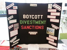 An information booth on the BDS movement, set up at the CAW Student Centre by the University of WIndsor's Palestinian Solidarity Group in November 2013.