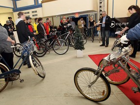John Scott (right) blesses the bikes during a kickoff event for bike week at the Walkerville Theatre in Windsor on Thursday, March 27, 2014.                        (TYLER BROWNBRIDGE/The Windsor Star)