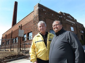 Bill Vitale, left, of Vitale Produce and Realtor Joe Monteleone are shown Monday, March 31, 2014, at the company's Mercer St. location in Windsor, Ont. The Vitale family wants to sell the large property they own next to Wigle Park for the new Catholic Central High School project. (DAN JANISSE/The Windsor Star)