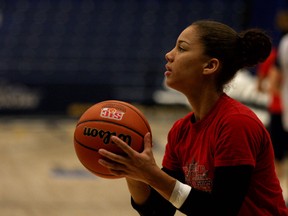 Korissa Williams shoots the ball around during a media availability for the University of Windsor's women's basketball team at the St. Denis Centre, Tuesday, March 11, 2014.  Windsor hosted this year's CIS women's basketball championships March 14-16.  (DAX MELMER/The Windsor Star)