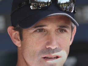 - Detroit Tigers manager  Brad Ausmus looks out to the field during the home opener against the Kansas City Royals Monday March 31, 2014 in Detroit, Michigan. (JASON KRYK/The Windsor Star)