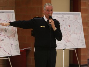 Windsor Fire chief Bruce Montone talks to area residence about the new fire station plan during a town hall meeting at South Windsor Arena in Windsor on Thursday, March 27, 2014.                        (TYLER BROWNBRIDGE/The Windsor Star)