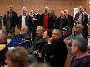 In this file photo, area residents and firefighters listen during a town hall meeting at South Windsor Arena in Windsor on Thursday, March 27, 2014.                        (TYLER BROWNBRIDGE/The Windsor Star)