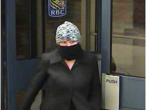 A March 2014 surveillance camera image of a person suspected of credit card fraud in Windsor, Ont. (Handout / The Windsor Star)