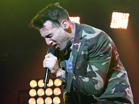 Hedley lead singer Jacob Hoggard performs at the WFCU Centre on Saturday, March 1, 2014. (REBECCA WRIGHT/ The Windsor Star)