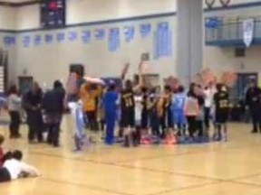 The South Windsor Warriors protested during a basketball tournament in Hamilton.