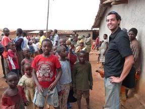 A photo of Michael Pietrzak, co-founder of LightSeed Energy, in an African village. (Photo supplied by LightSeed Energy.)