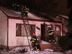 Windsor fire crews respond to the second fire in one day at a Parent Avenue home on Saturday, March 1, 2014. (DAX MELMER/ The Windsor Star)