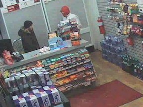 Windsor police handout surveillance photo of a man robbing  a Petro Canada on March 16, 2014