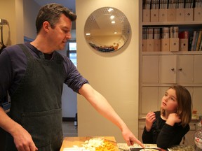 University of Windsor professor Robert Nelson in the kitchen with his daughter. The history professor and avid cook has landed on Saveur magazine's radar. (Photo: Courtesy Kim Nelson)