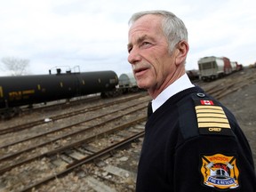 Windsor Fire chief Bruce Montone is photographed near the Crawford rail yard in Windsor on Thursday, March 20, 2014. Concerns are being raised about the dangerous materials that are transported through communities by rail.                     (TYLER BROWNBRIDGE/The Windsor Star)