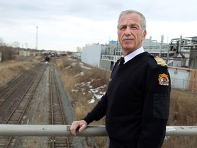 Windsor Fire chief Bruce Montone is photographed near the Crawford rail yard in Windsor on Thursday, March 20, 2014. Concerns are being raised about the dangerous materials that are transported through communities by rail.                     (TYLER BROWNBRIDGE/The Windsor Star)