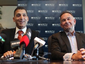 Mayor Eddie Francis, left, speaks to the media with WFCU president and CEO, Marty Komsa, announcing Francis' new position with the company as vice-president, operations and member experience, Wednesday, March 26, 2014.  Francis will begin his new role December 1st, 2014. (DAX MELMER/The Windsor Star)