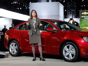 Cristi Landy, Marketing Director Chevrolet Small Cars, unveils the 2014 Chevrolet Cruze Diesel at the Chicago Auto Show in February 2013 in Chicago. (Charles Rex Arbogast / Associated Press files)