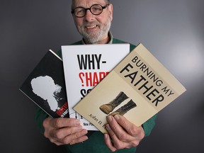 Marty Gervais, a writing teacher with the University of Windsor, displays books that were produced by his students. (DAN JANISSE / The Windsor Star)