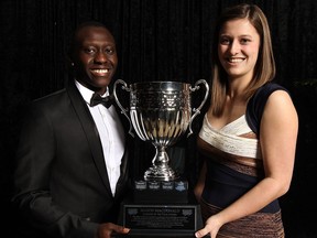 Gabe Poulino, left, and Alexa Georgiou won the male and female athletes of the year at the St. Clair College Athletics banquet at the St. Clair Centre for the Arts Wednesday. (TYLER BROWNBRIDGE/The Windsor Star)